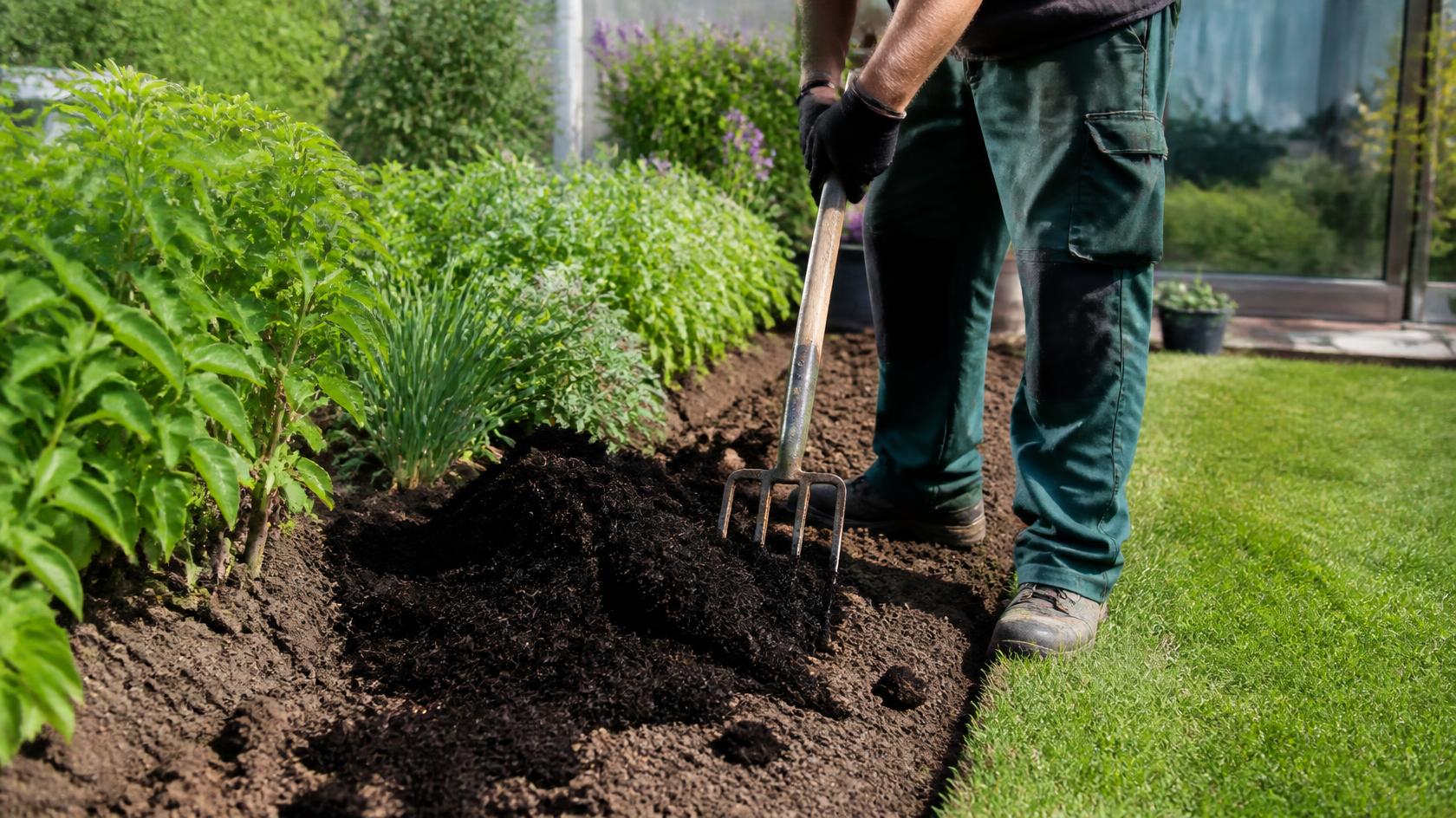 Improving clay soil drainage with compost in Olathe, KS