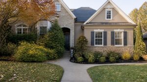 Before and after replacement of overgrown foundation landscaping